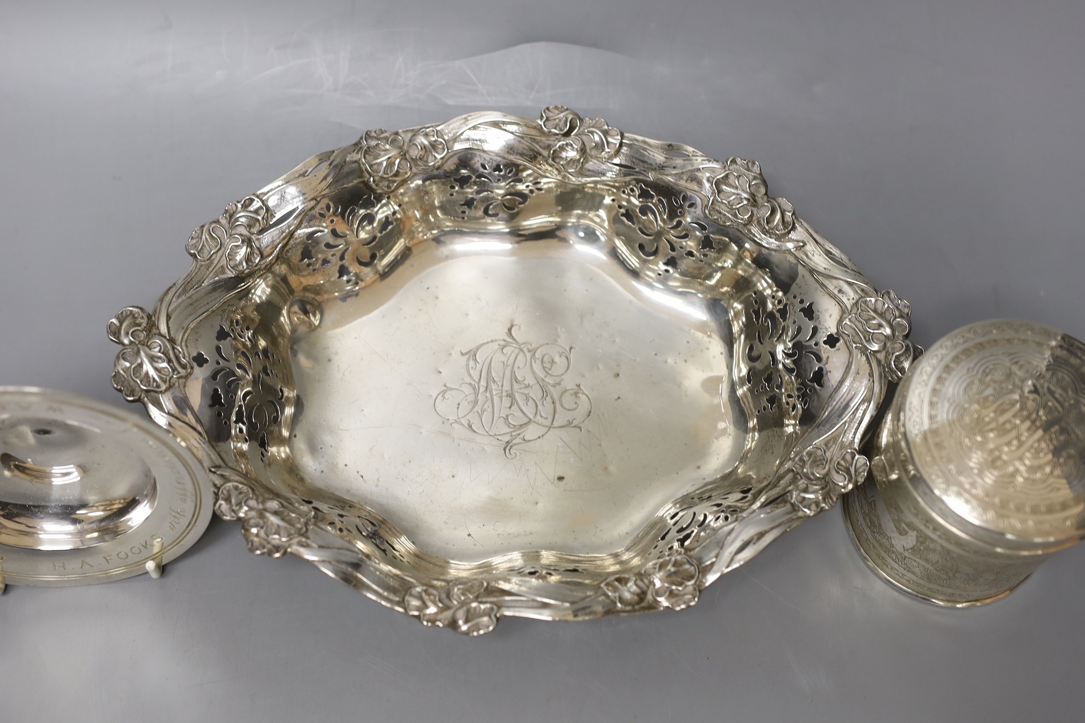 An American pierced sterling bowl, by Caldwell & Co, 28.5cm, a 1960's small silver armada dish and an Egyptian white metal canister and cover